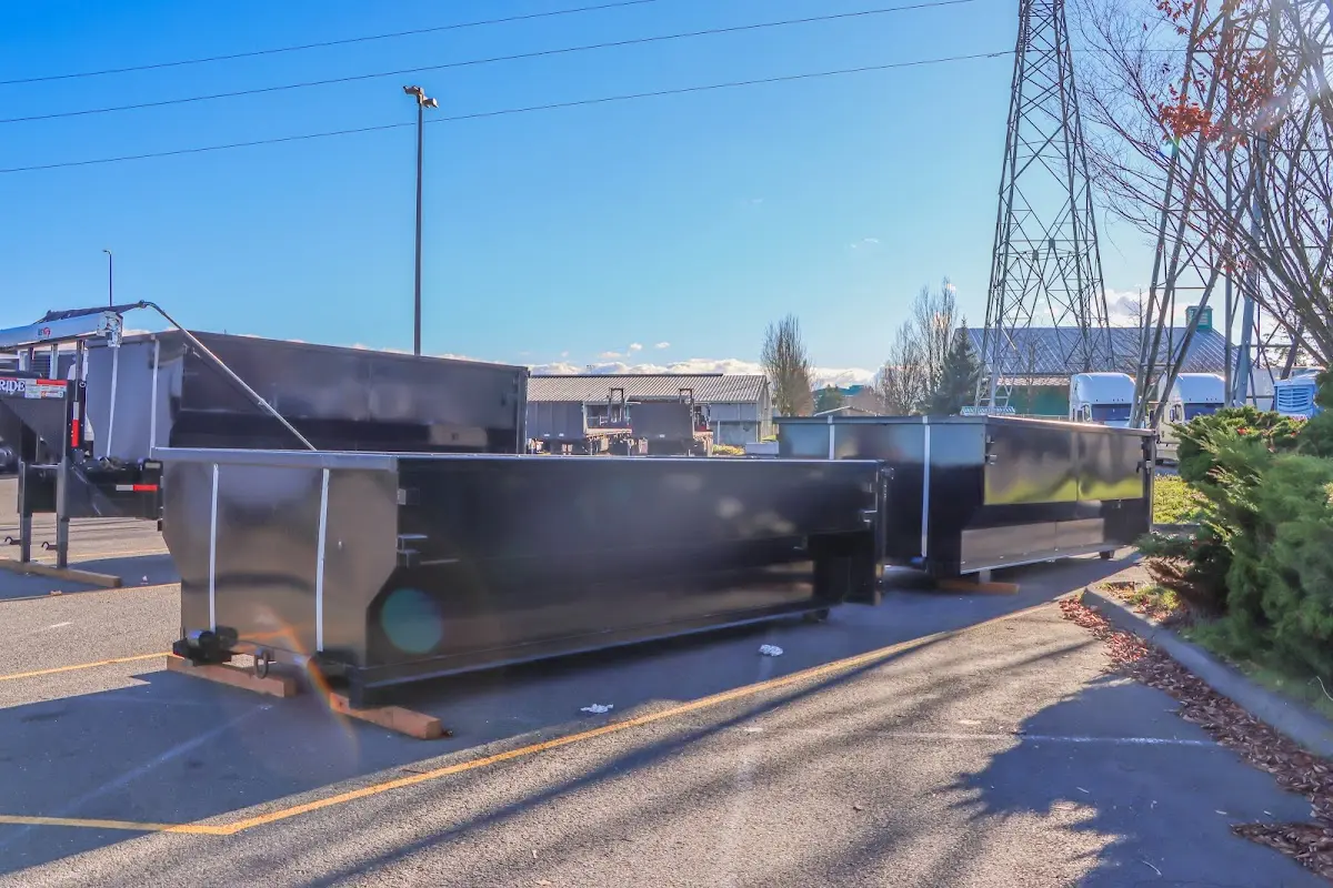 Roll-off dumpster ready for waste disposal at job site for Construction Dumpster Rental in Spencer